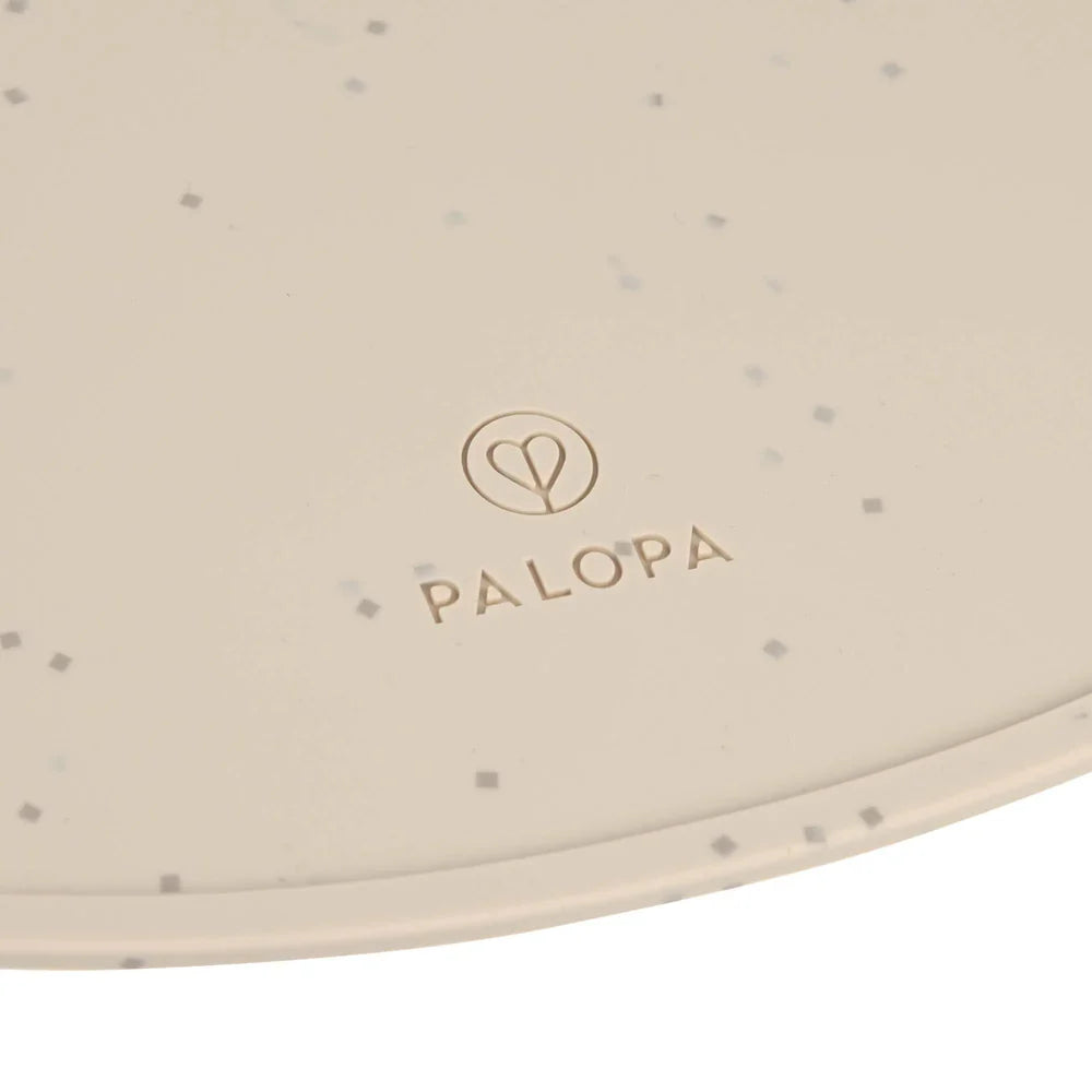 Palopa-Napfunterlage-Loua-Taupe-Granulat-Logo